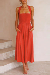 Bendita Pocketed Smocked Cross Back Midi Dress