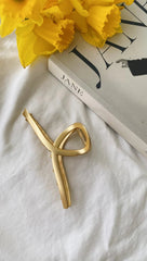 Goldene Twist-Haarspange