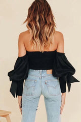 Schwarzes schulterfreies Top