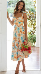 Orangefarbenes Midikleid mit Blumenmuster und Schulterschnürung