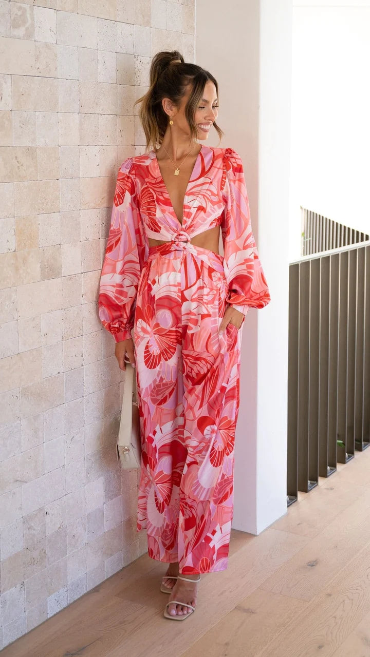 Rosa Jumpsuit mit Blumenmuster und Cut-Out-Taille
