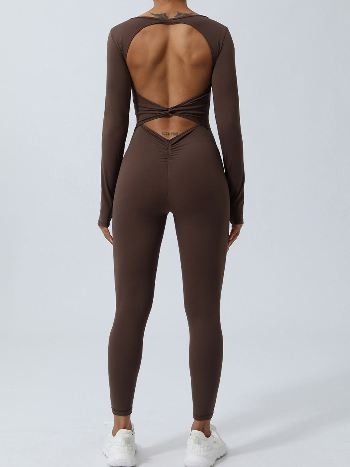 Verdrehter rückenfreier Langarm-Jumpsuit