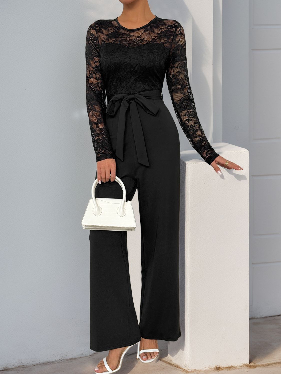 Perfee – Langärmliger Jumpsuit mit Rundhalsausschnitt und Spitze