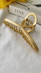 Goldene Twist-Haarspange