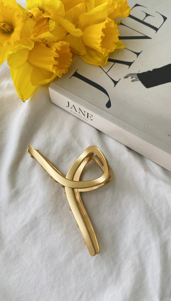 Goldene Twist-Haarspange