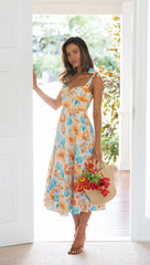 Orangefarbenes Midikleid mit Blumenmuster und Schulterschnürung