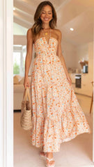 Orangefarbenes Neckholder-Maxikleid mit Blumenmuster