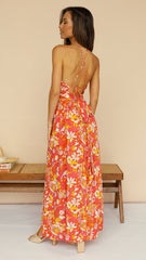 Oranges, rückenfreies Kleid mit Blumenmuster und hohem Schlitz